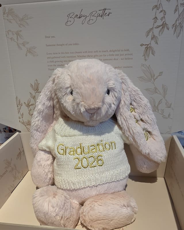 A Jellycat bunny in a knitted sweater embroidered Graduation 2026, in a Baby Butter gift box